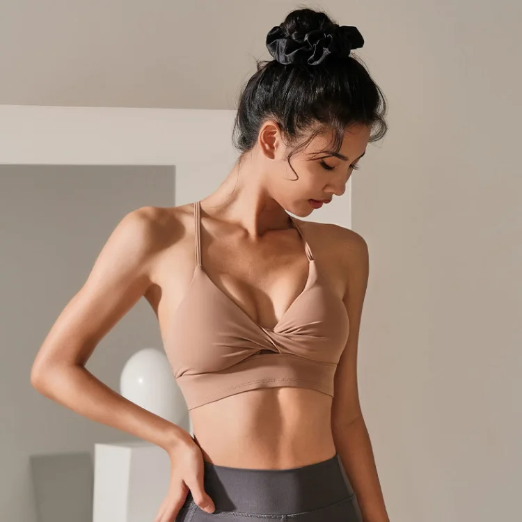 Wholesale Women Fitness Running Nude Yoga Clothes Padded Strappy Twist Sports Bra